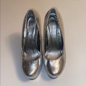 Glistening silver high heels